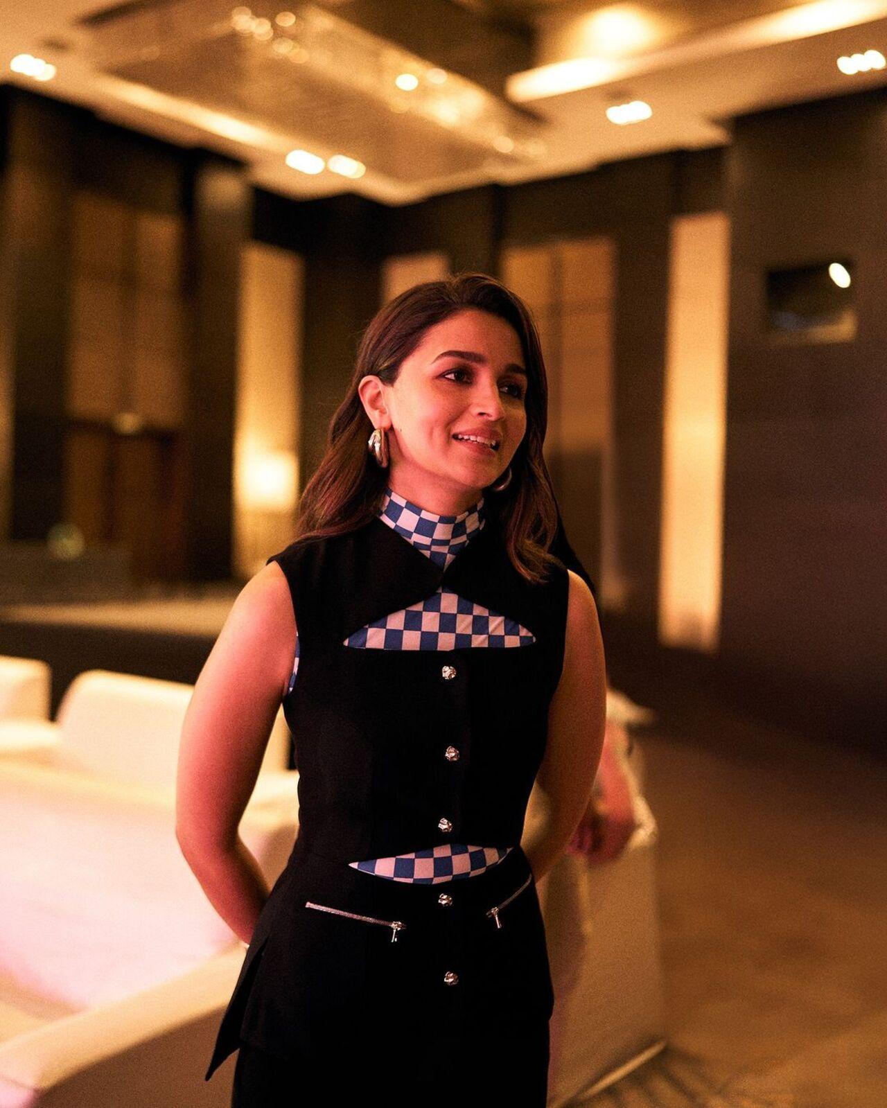 Here's she wore another co-ord set with checkered bits, certainly something you'd want to wear at work.