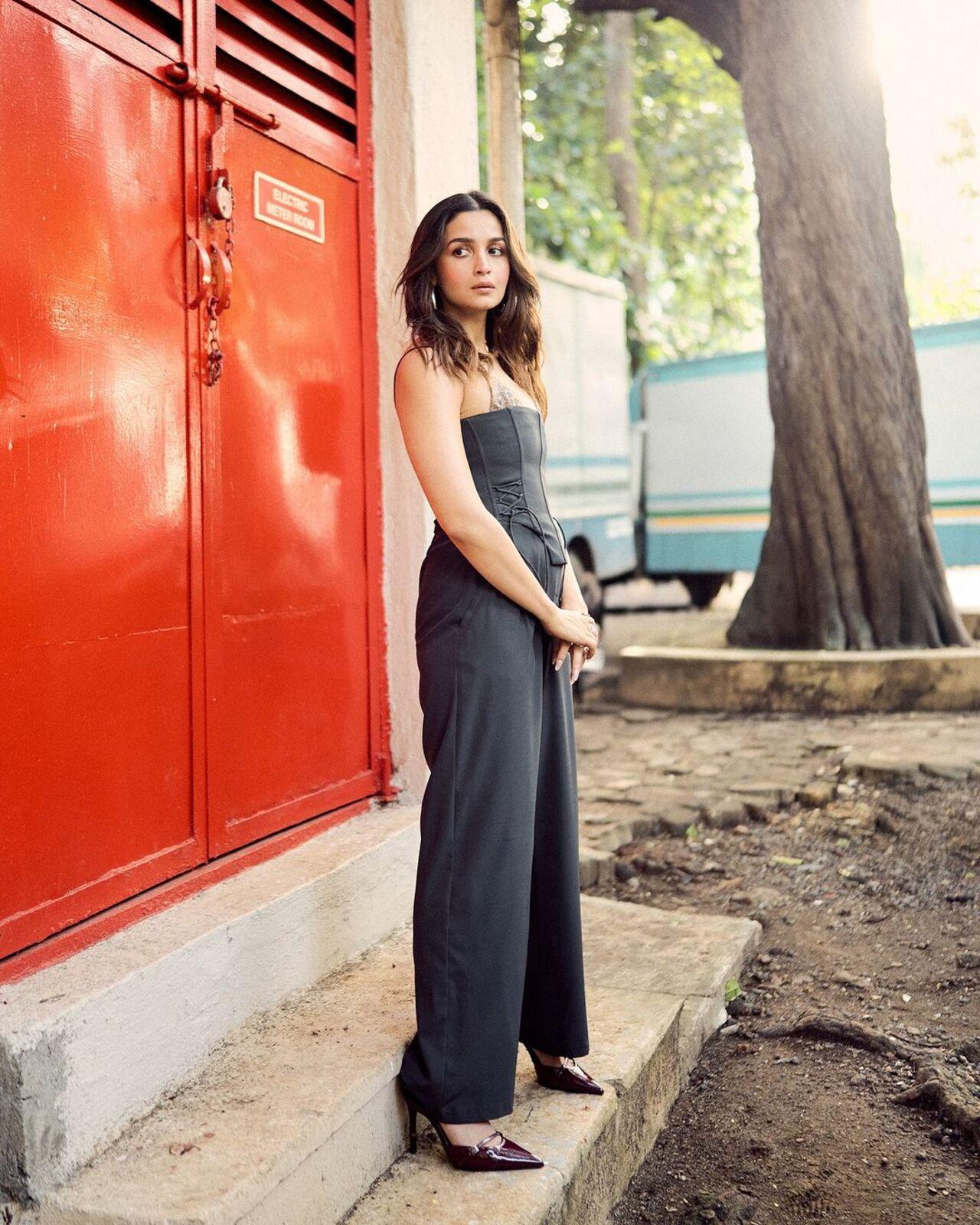 For this appearance she wore a jumpsuit that allowed a sneak peek moment for her bralette. 