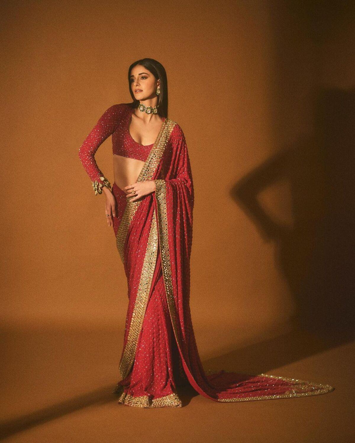 She paired it with a green and golden choker and matching earrings. Ananya chose a statement bracelet and also adorned a few rings.