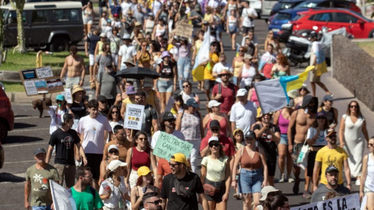 The demonstration followed large protests held in April in town squares across the archipelago against a model of mass tourism critics say favours investors at the expense of the environment, and that prices local residents out of housing and forces them into precarious jobs.