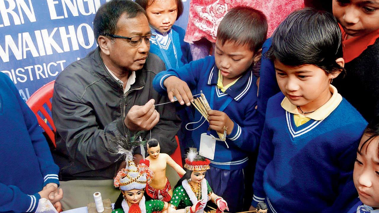 Konsam Ibomcha Singh holds workshops to teach school children the art of making Laiphadibi dolls