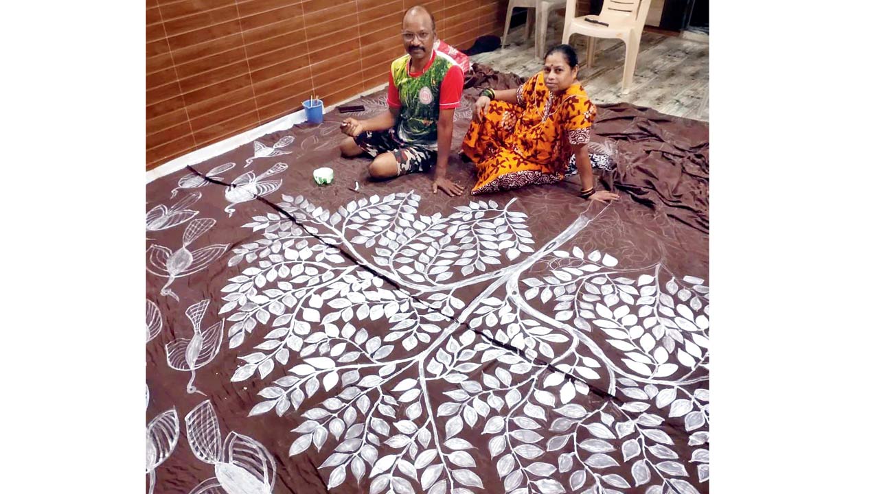 (Left) Prakash Bhoir creates Warli art paintings on the fabric