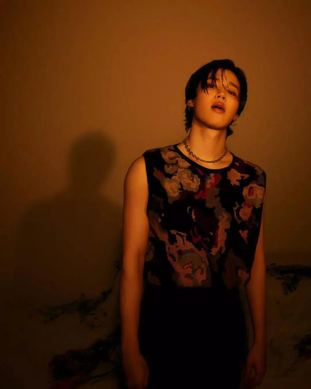 Jimin doesn't shy away from floral patterns. One memorable photo captured him in a floral top, showcasing a more playful and colorful side to his style.