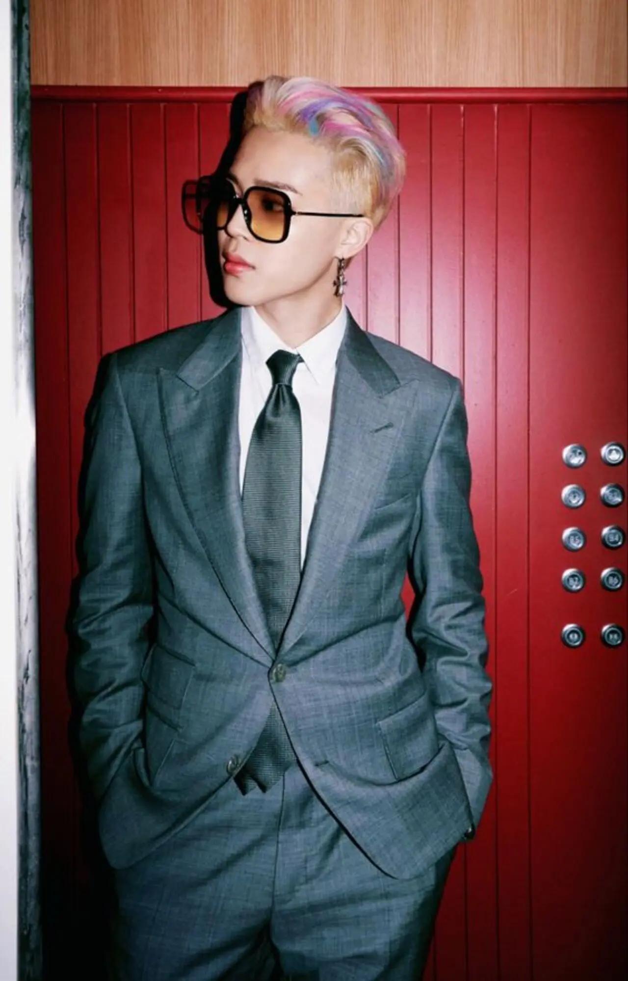 No words need to be said for how dashing Jimin looks during his 'Butter' photoshoot. The 'Promise' singer is known for having dyed his hair with some funky colours - but this rainbow coloured combination might be the craziest yet! Pair that with some tinted glasses - enough to make ARMY swoon!