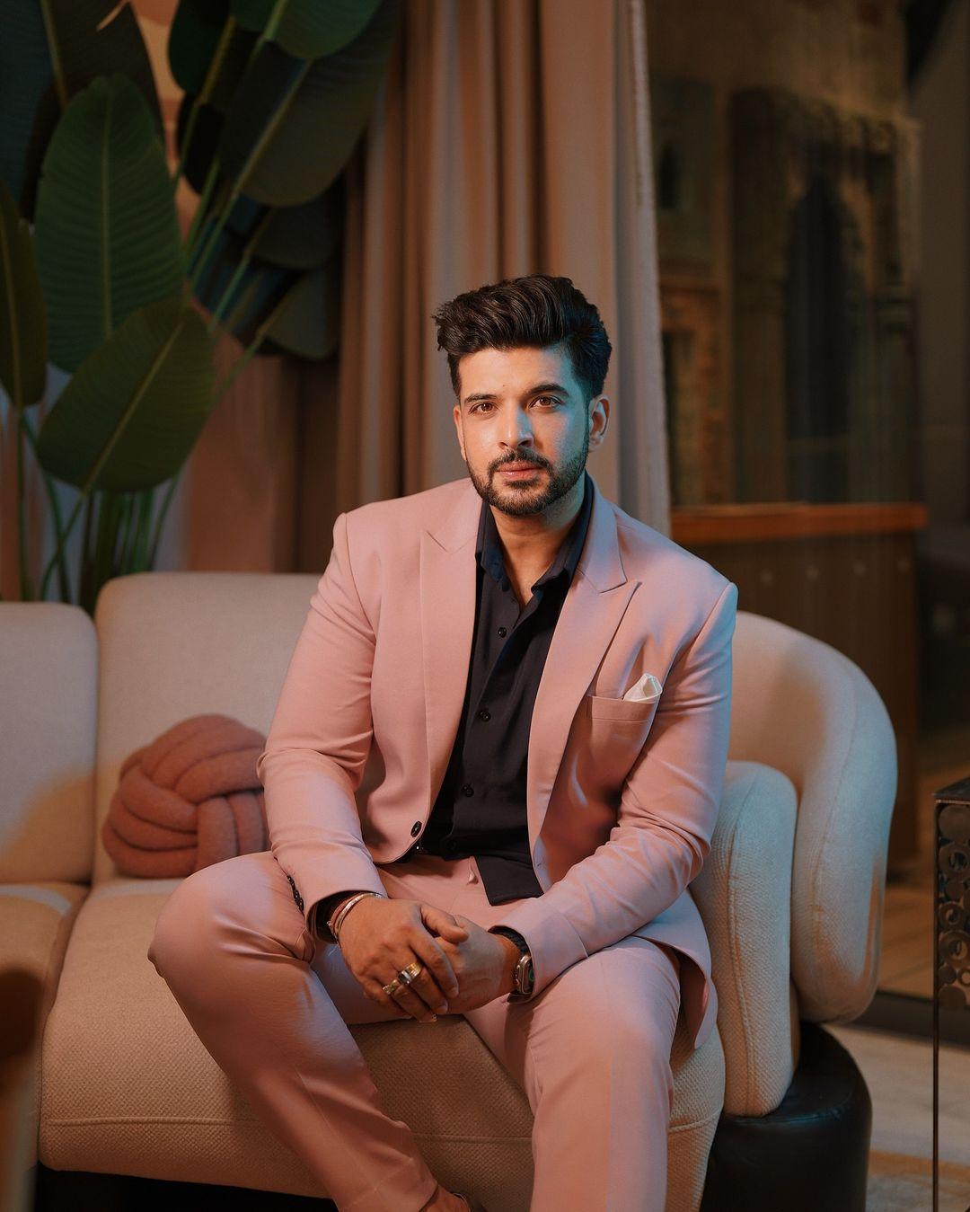 Karan Kundrra looked striking in a mauve suit, complete with matching trousers for a cohesive look.