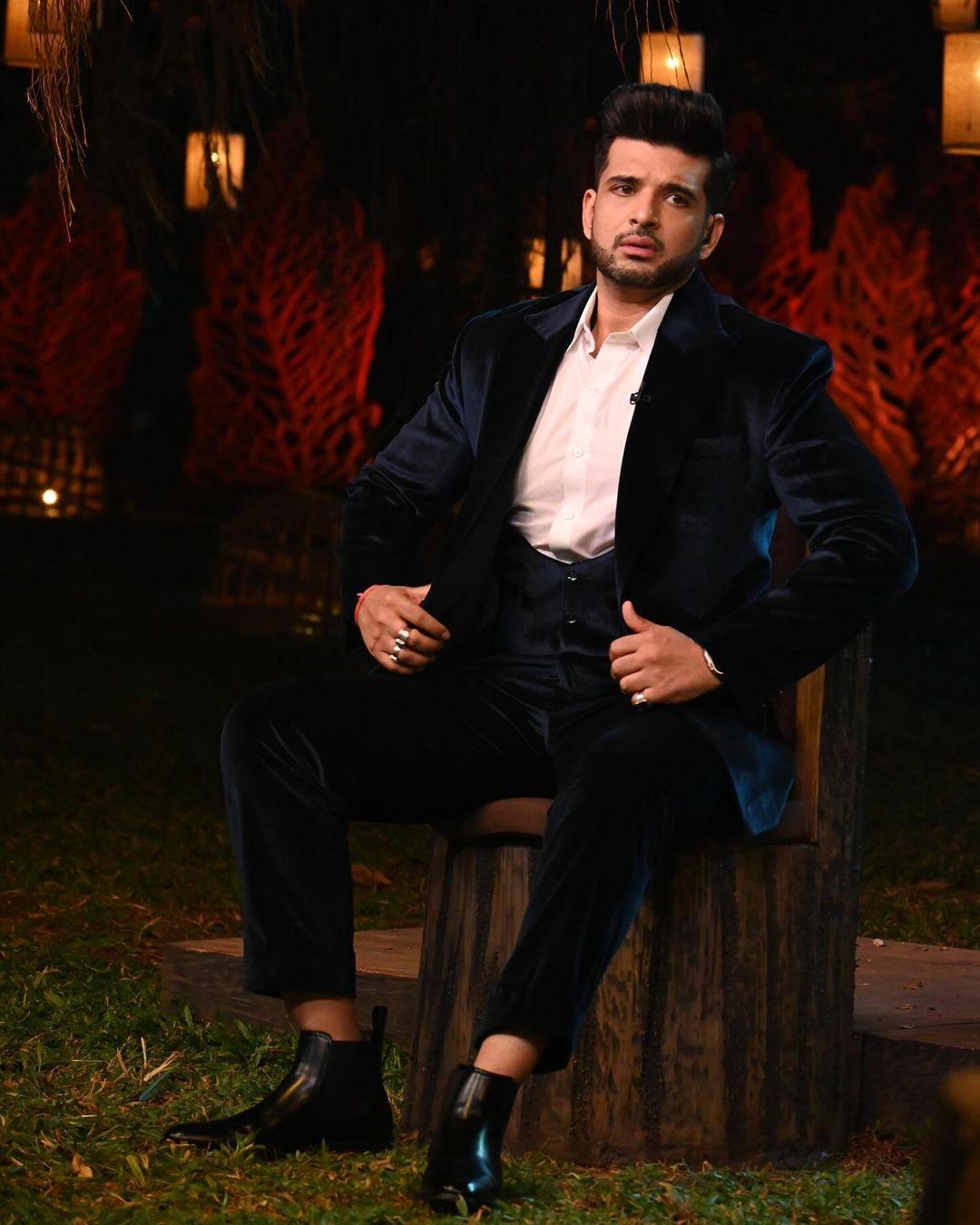 Karan Kundrra exuded class in a velvety blue suit, effortlessly catching everyone's eye. The crisp white undershirt added a fresh contrast, enhancing the richness of the blue fabric.