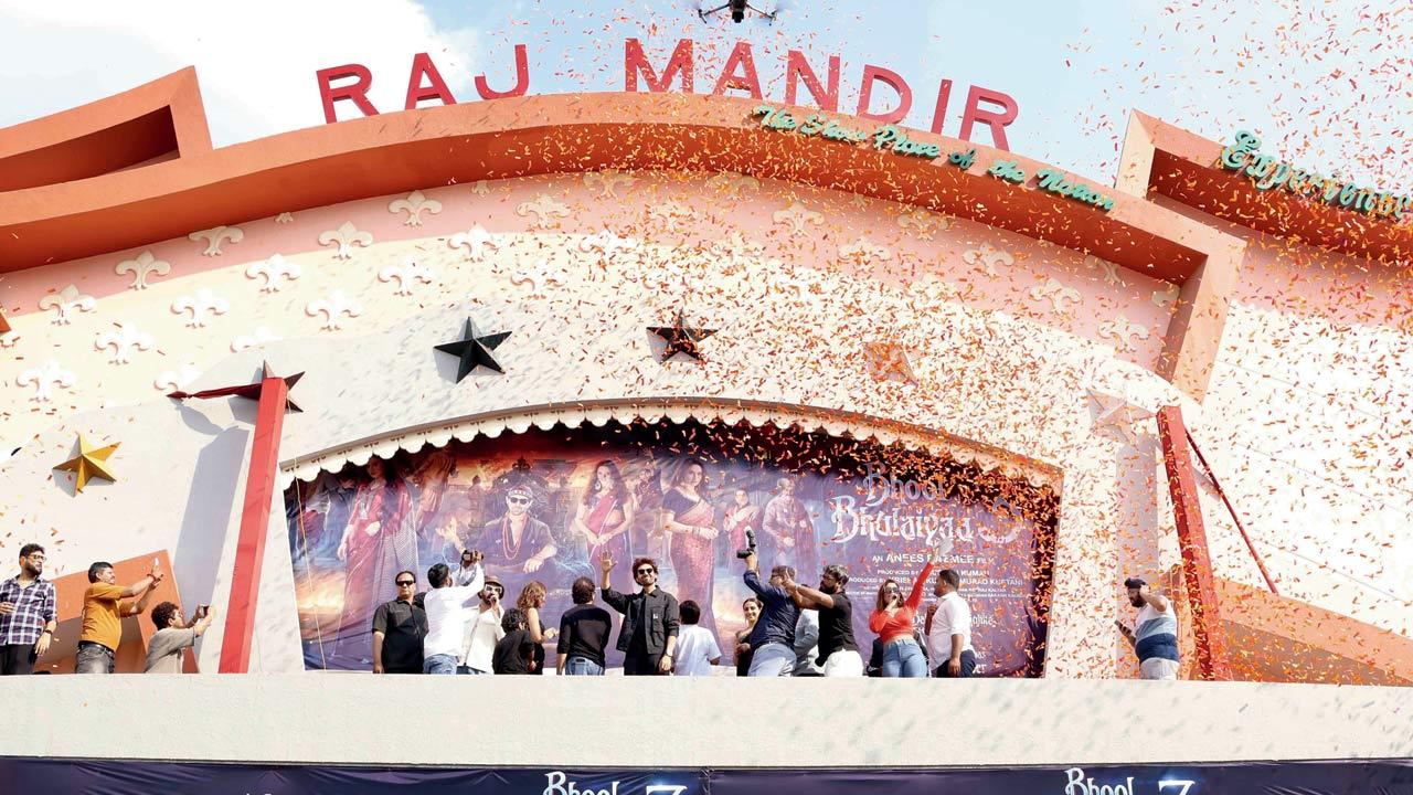 The team unveils the poster outside Raj Mandir Cinema. Pic/Yogen Shah
