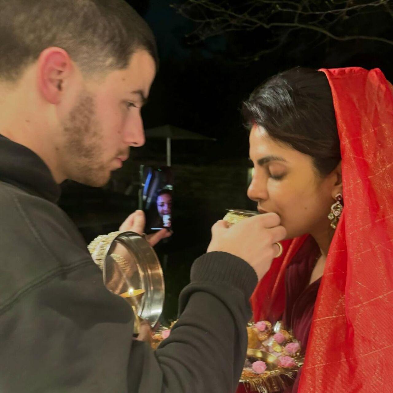 The actress posted pictures of her celebrating the festival by following rituals. Her mother Madhu Chopra could be seen on a video call, possibly instructing the rituals to the couple