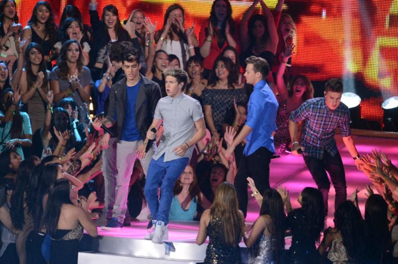 With time, the band 'One Direction' became one of the best-selling boy bands of all times. They released five studio albums between 2011 and 2015, including hits like 'What Makes You Beautiful', 'Story of My Life', and 'Drag Me Down'. They earned legions of fans worldwide, known as 'Directioners'