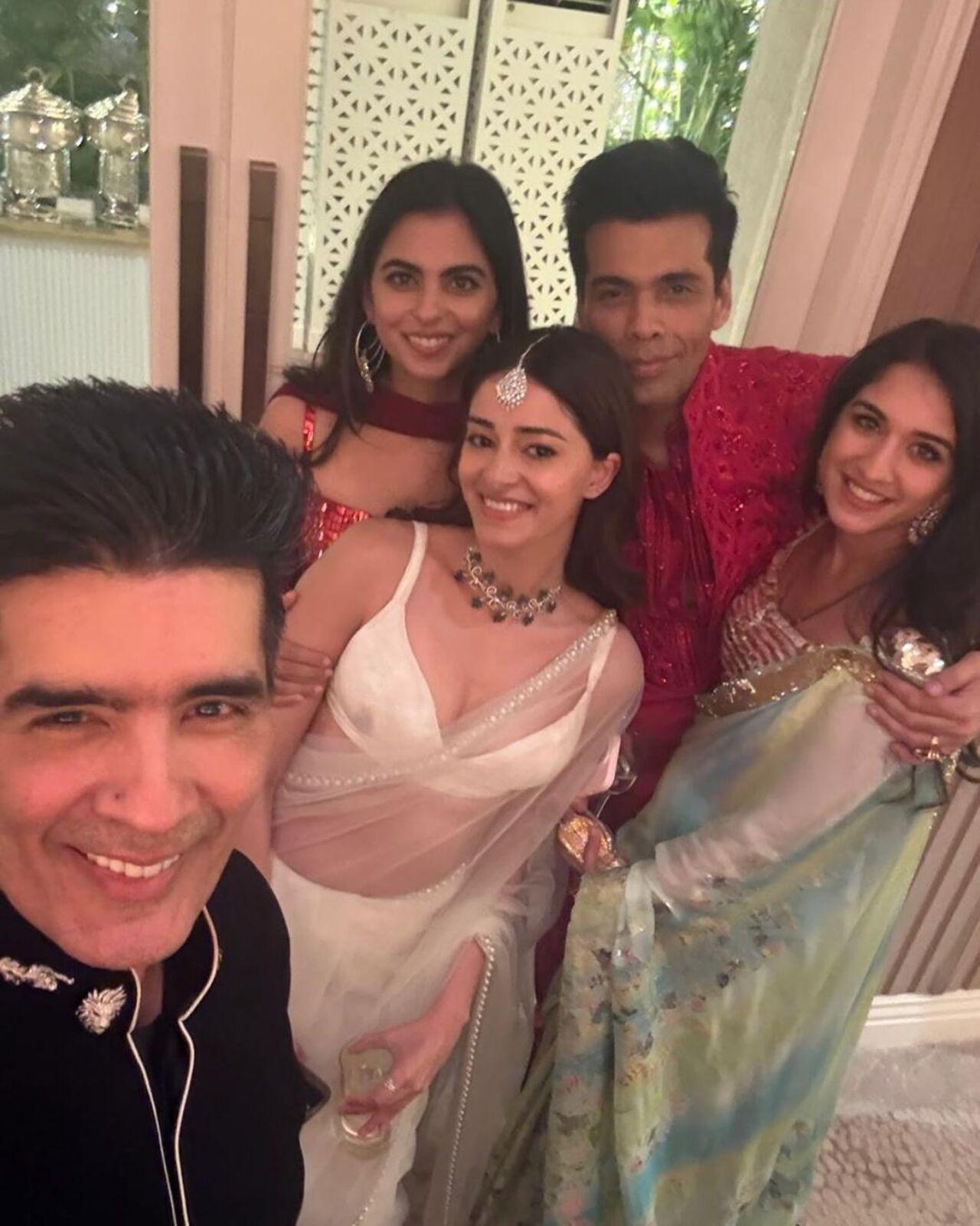 Manish clicks a selfie with Karan Johar, Isha Ambani, Radhika Merchant and Ananya Panday