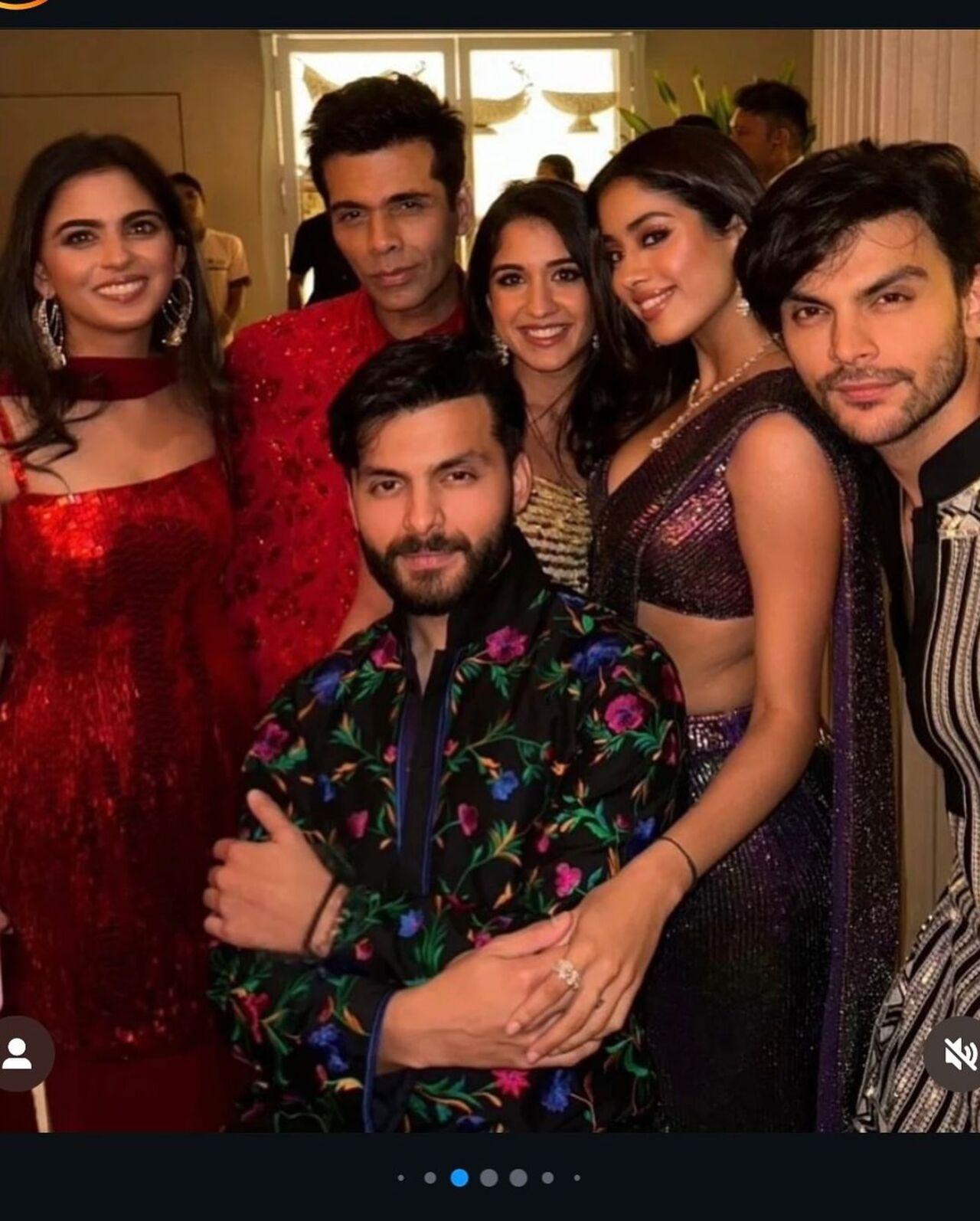 Karan Johar poses with the younger lot- Isha Ambani, Radhika Merchant Ambani, Janhvi Kapoor and her boyfriend Shikhar Pahariya, Veer Pahariya