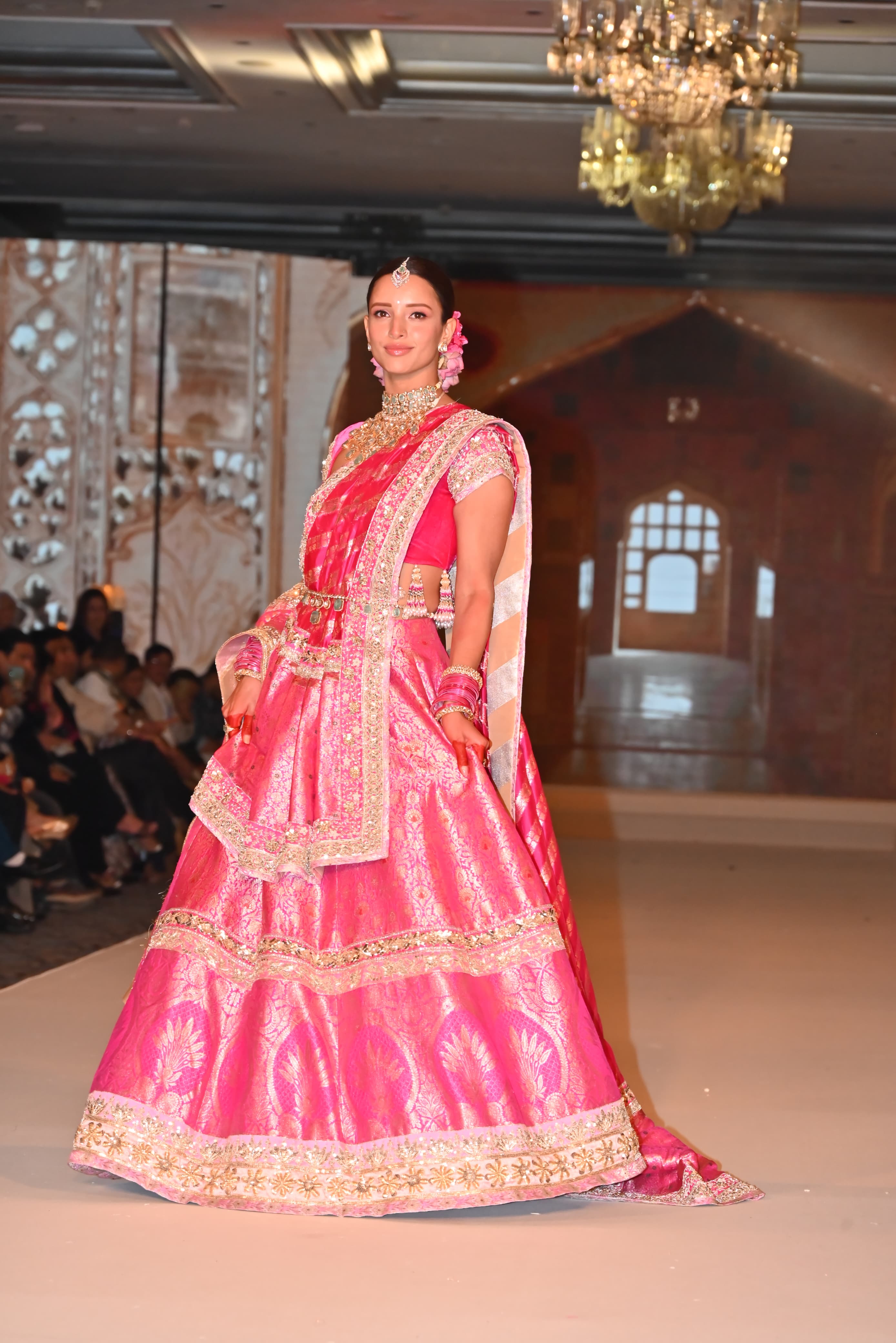 Triptii Dimri looked radiant in a beautiful pink and gold brocade lehenga, paired with elegant jewelry.