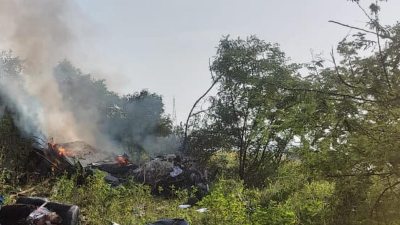 After the crash, the chopper caught fire, police said. Pics/Special Arrangements by Diwakar Sharma