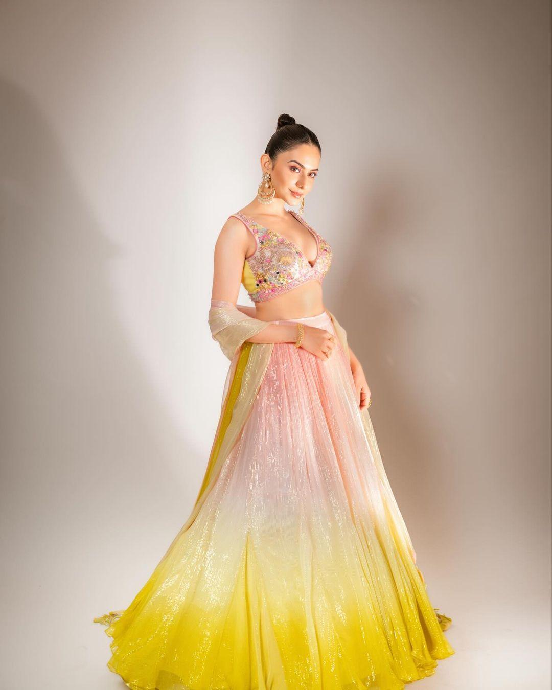 The actress tied her hair in a chic bun, wore beautiful long earrings, and applied minimal makeup to strike a perfect balance.