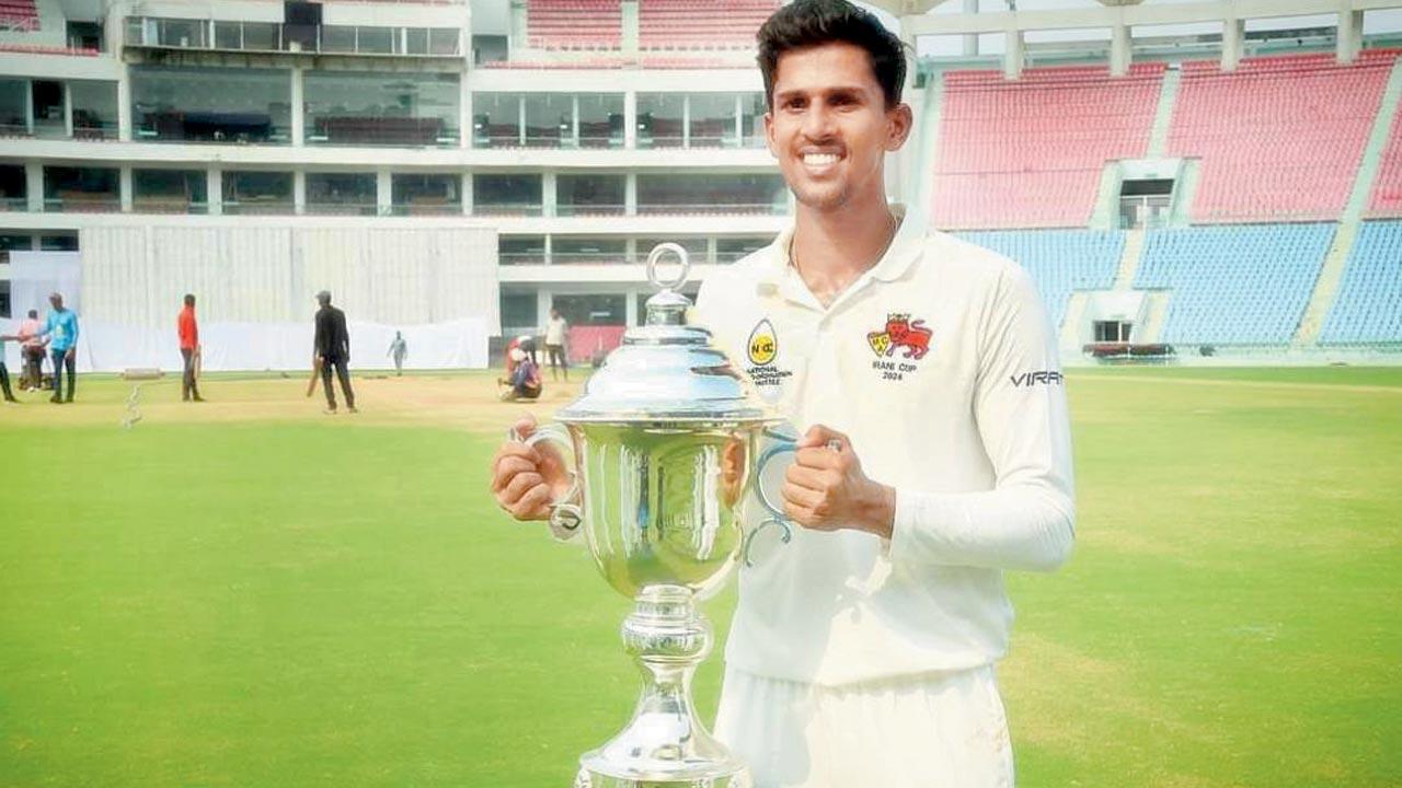 Tanush Kotian with the silverware