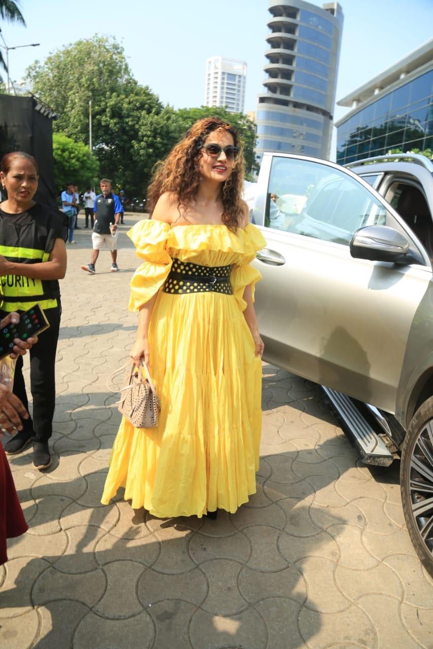 Taapsee Pannu stunned in a yellow sleeveless dress paired with stylish belt