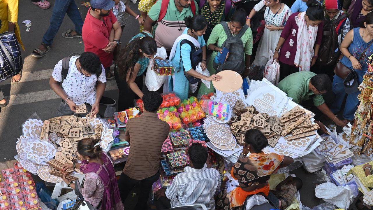 Mumbaikars carefully select traditional clay diyas (lamps), which illuminate homes during the five-day festival, symbolising the triumph of light over darkness, along with kalash (sacred pot) stickers to put on main doors