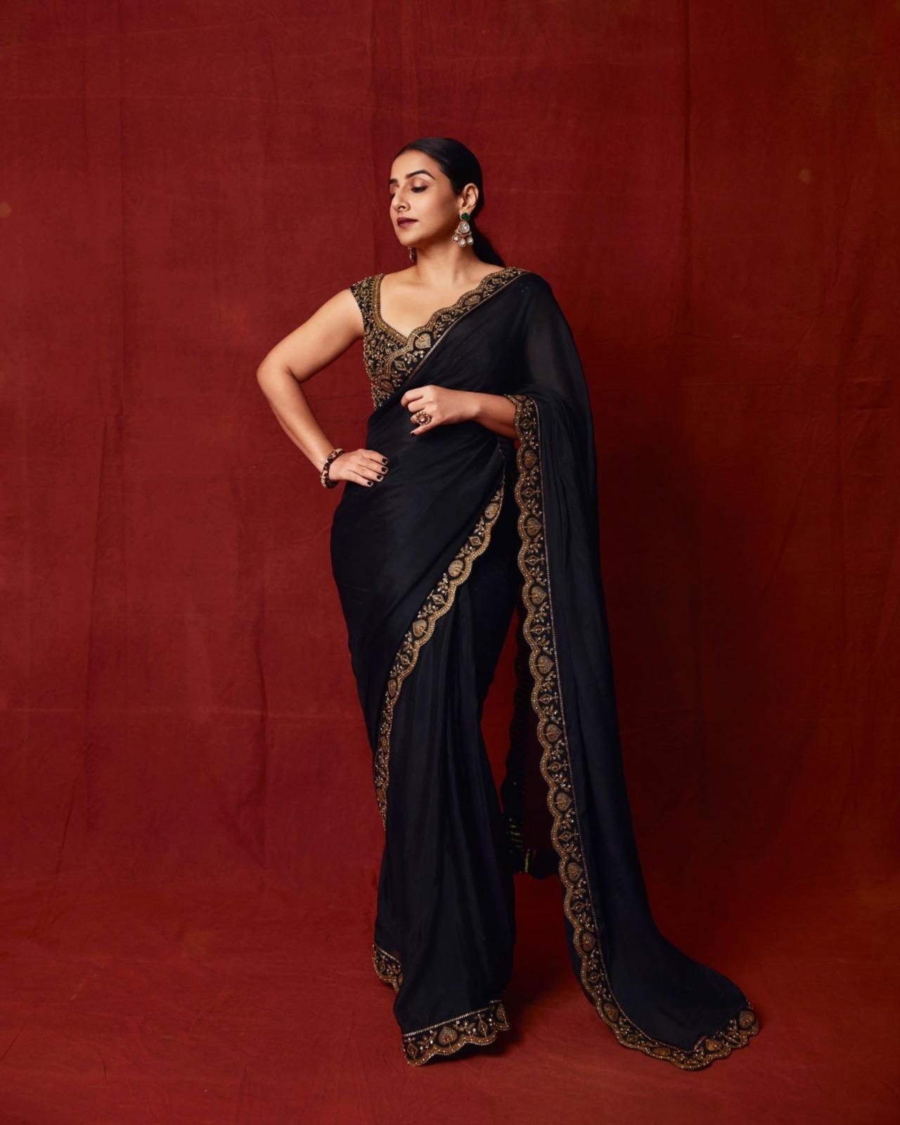 The blouse, with its mega sleeves and heavy design, added a dramatic flair to the outfit. This look was a perfect blend of traditional elegance and contemporary style