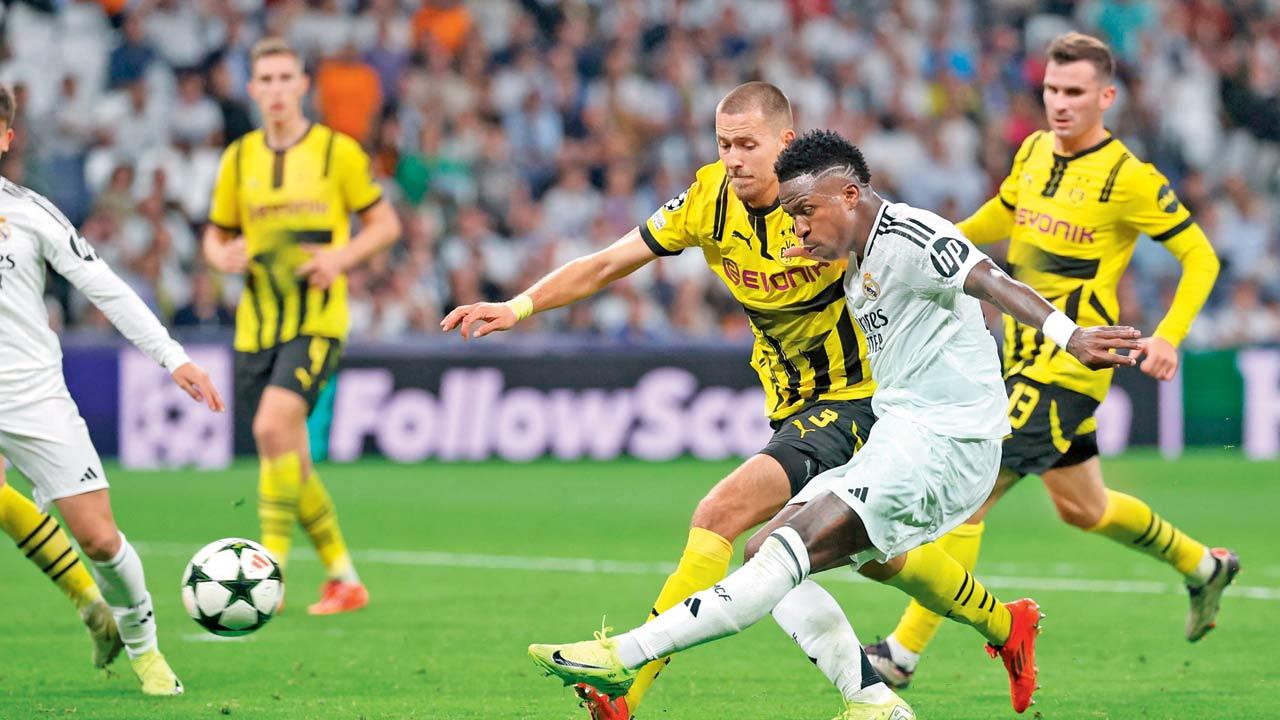 93rd min: Vinicius completes his  hat-trick from close range for 5-2
