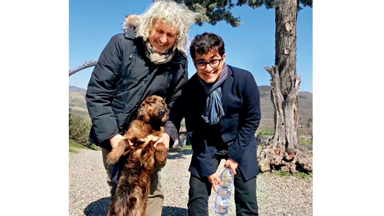 (Right) Prithvi Nagpal meets Baruffo the dog who inspired the beloved Cantalici Chianti Classico Baruffo wine of Italy