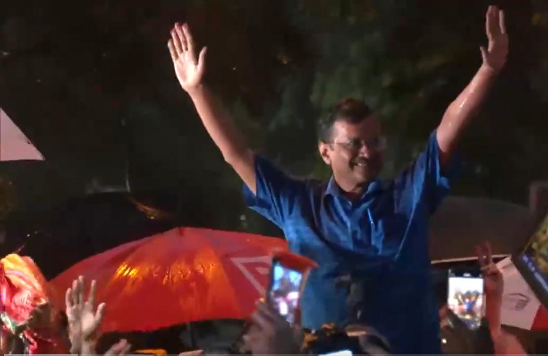 Delhi Chief Minister Arvind Kejriwal greets supporters outside Tihar jail in Delhi on Friday  