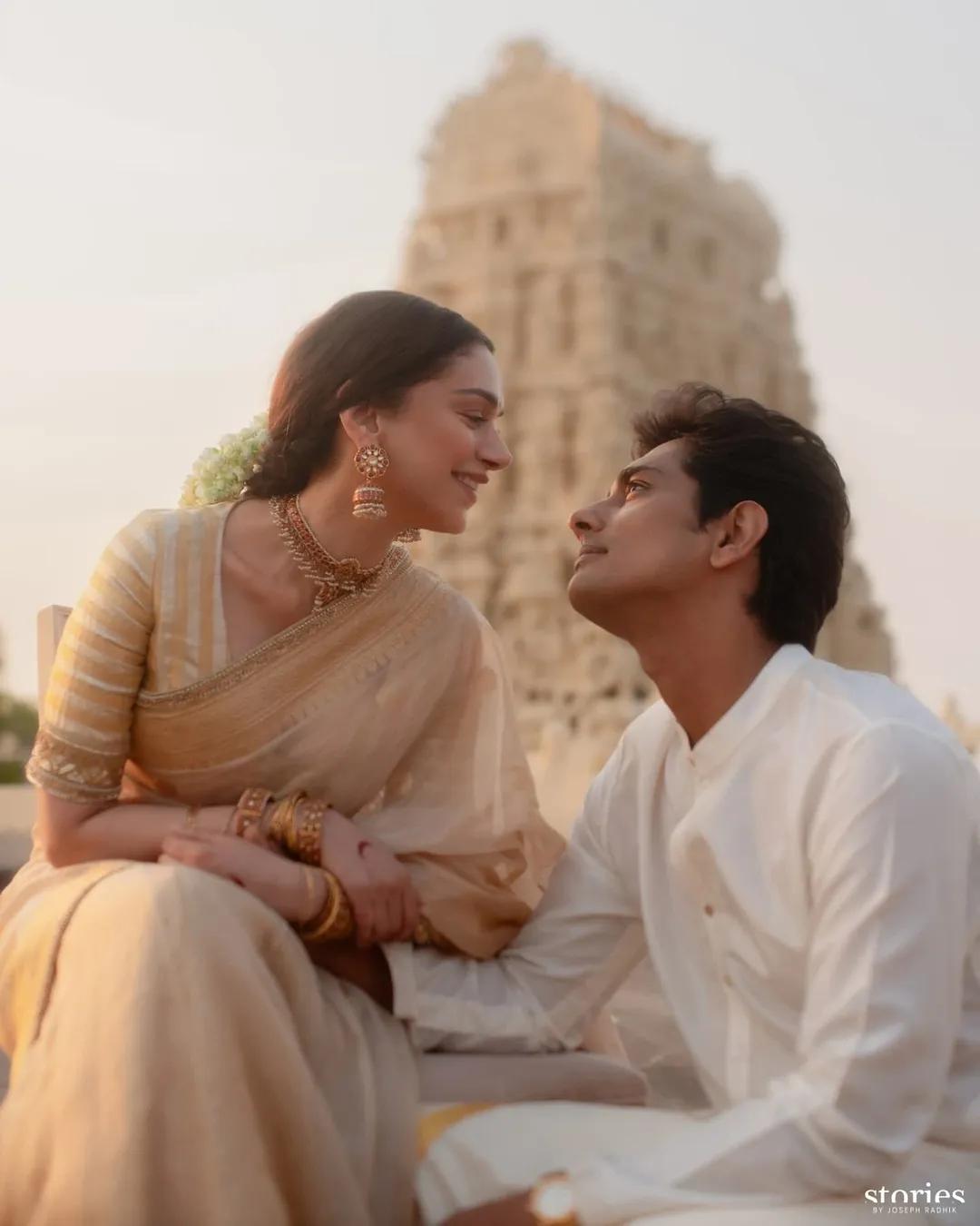 Drowned in each other's eyes, Aditi and Sid posed in front of a beautiful temple, and we couldn't take our eyes off the new couple