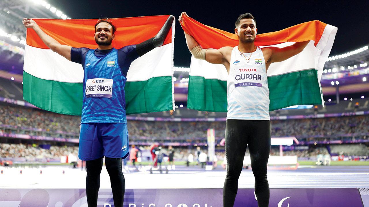 India’s javelin throw silver medallist Ajeet Singh (left) and bronze medallist Sundar Singh Gurjar in Paris on Tuesday. Pics/Getty Images