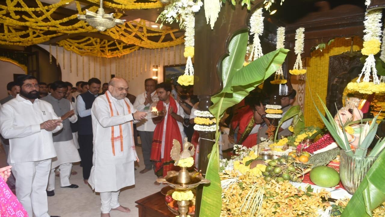 Union Home Minister Amit Shah performs an 'aarti' at CM Eknath Shinde's official residence during the Ganeshotsav 2024 festivities