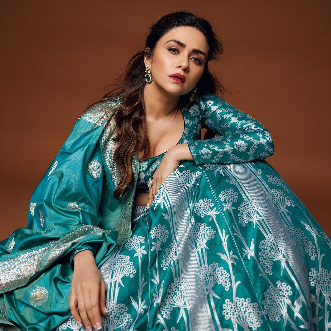 In this look, Amruta Khanvilkar wore a stunning sea-green printed lehenga. This is perfect for you if you are an 