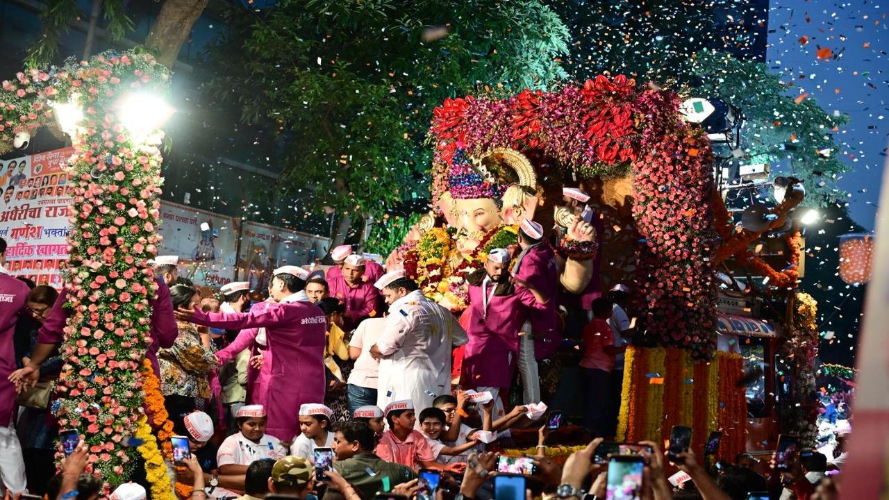 The Andhericha Raja Ganpati idol is taken across the Andheri West area, including parts of Amboli and Versova, before the immersion