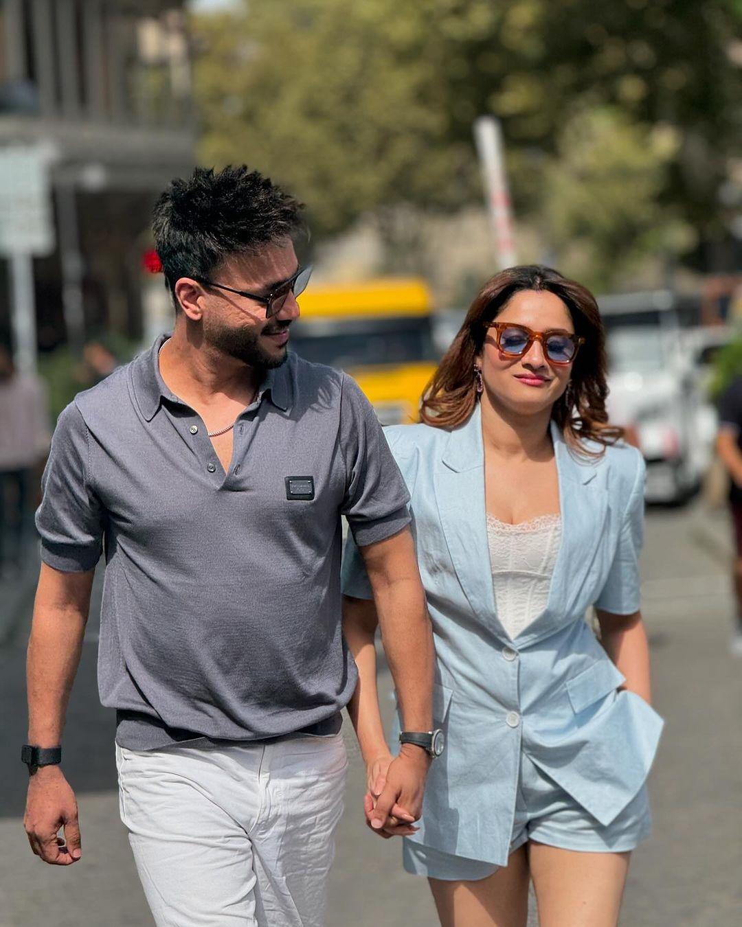 Ankita was seen wearing a white top paired with light blue shorts and a blazer, while Vicky complemented her in a gray t-shirt and white pants.