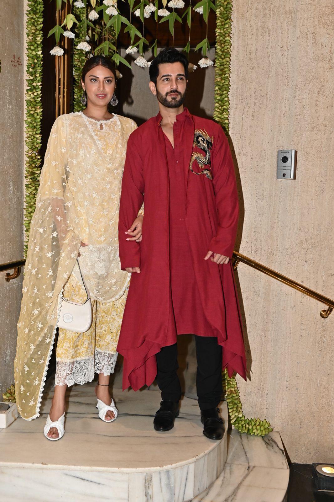 Aditya Seal also visited Malhotra with his wife. The couple posed for the camera stationed outside the residence