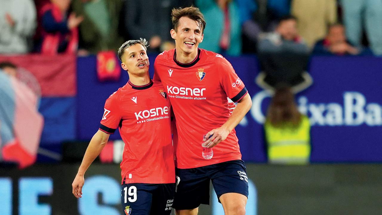Osasuna goal scorers Bryan Zaragoza (left) and Ante Budimir on Saturday. Pic/Getty Images