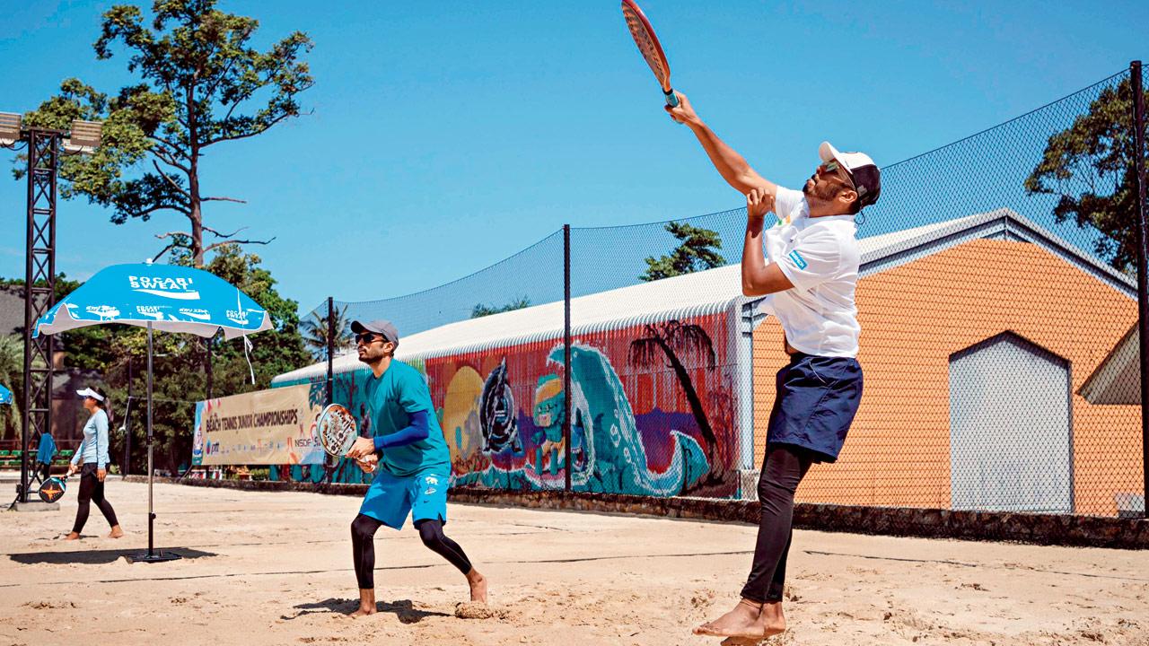 Unnat and Vishwajeet Sangle practise beach tennis