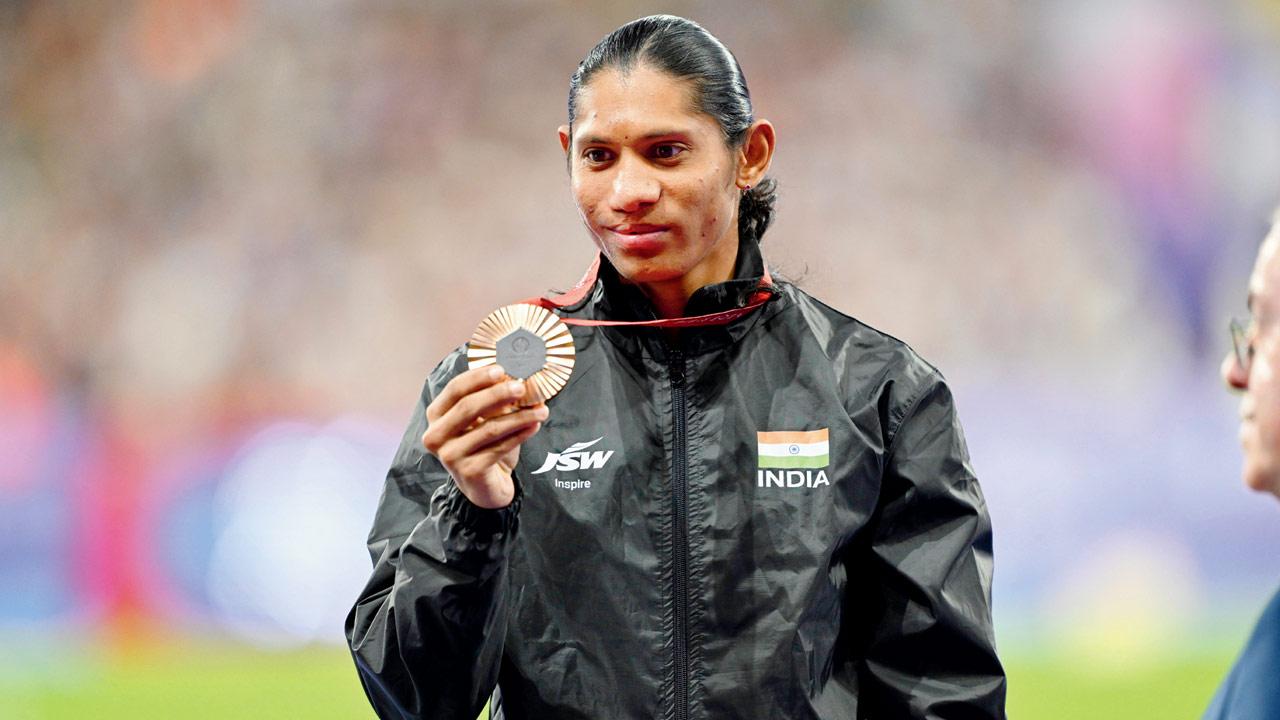 Deepthi Jeevanji with her 400m bronze medal in Paris on Tuesday
