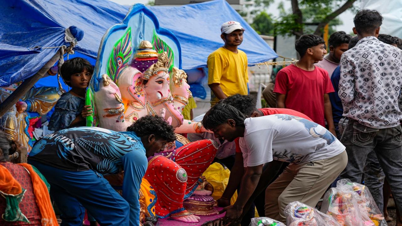 At national capital Delhi, devotees are taking home the idol of Lord Ganesha from a workshop