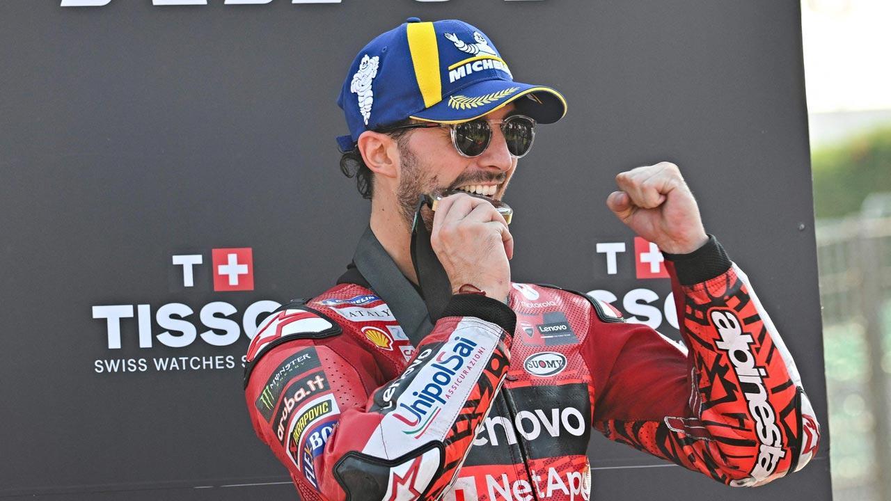 Ducati rider Bagnaia claims pole in Italy