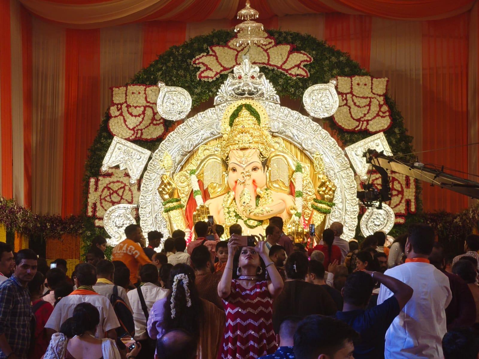 Selfie with Bappa: A devotee takes a picture with Mumbai's favourite deity at GSB Seva Mandal in King's Circle