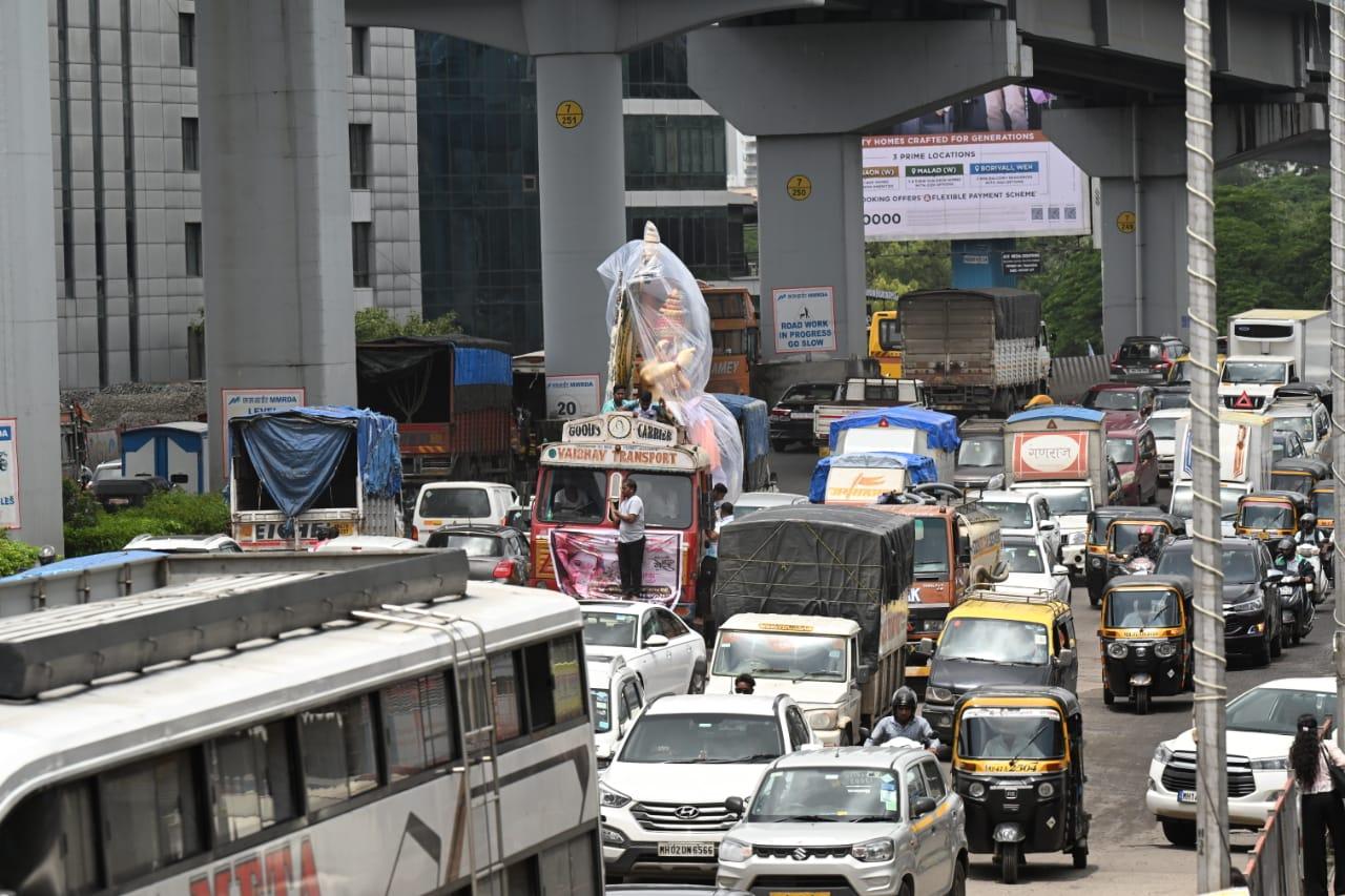 The idol of Lord Ganesha is covered as Mumbai has received light to moderate rainfall in the past few days