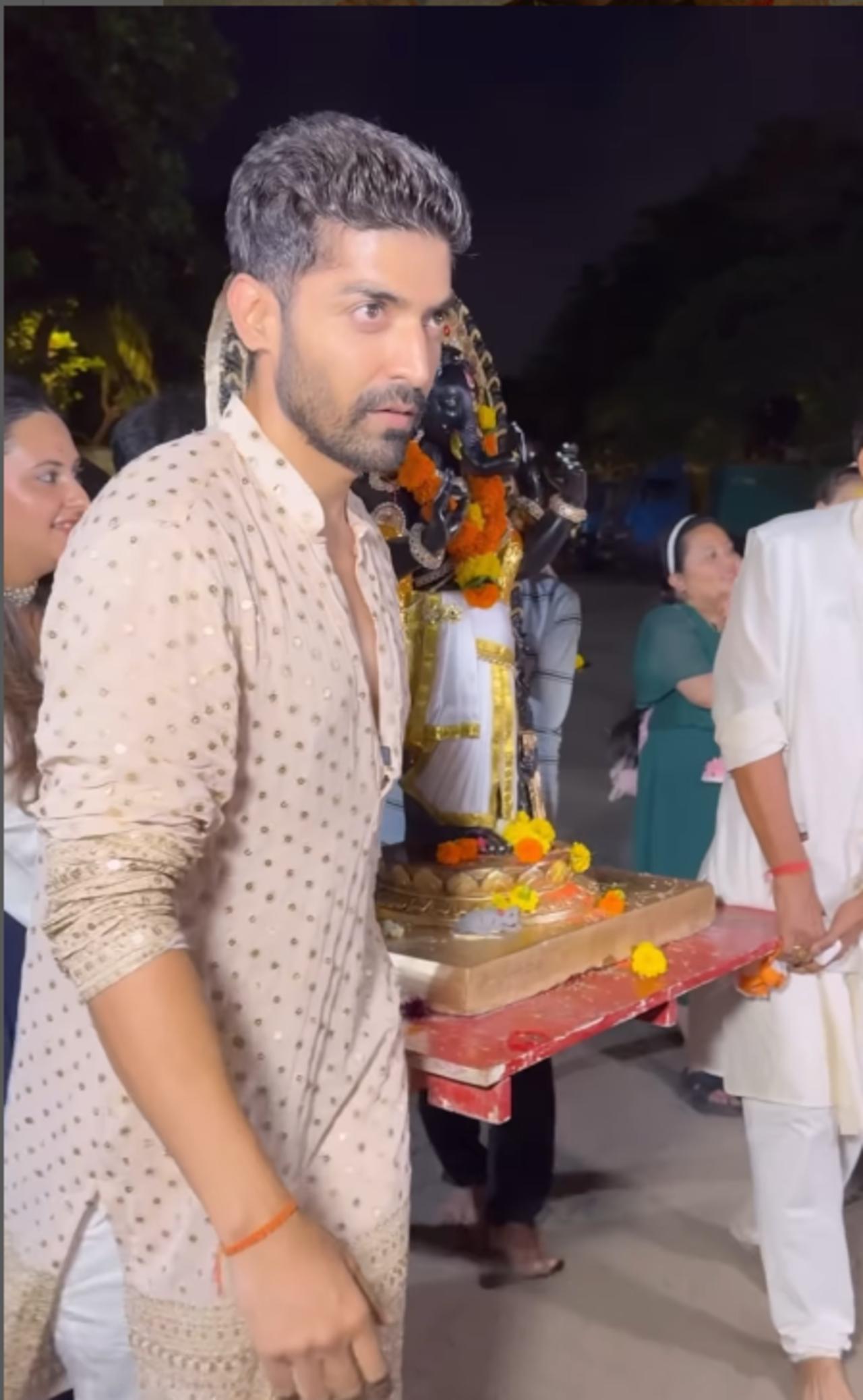 The couple, who welcomed Bappa for one and a half days, bid adieu to Ganesha last night