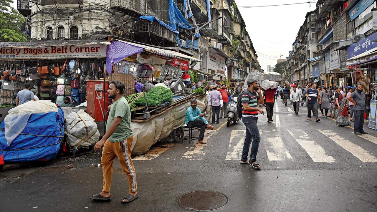 BMC removes illegal street hawkers from Crawford Market on July 29. Pic/Ashish Raje