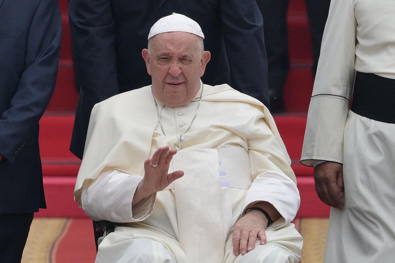 After an overnight flight from Rome, Francis was wheeled off the plane in his wheelchair and onto the tarmac for a welcoming ceremony under Jakarta's perennial hazy, humid and polluted skies