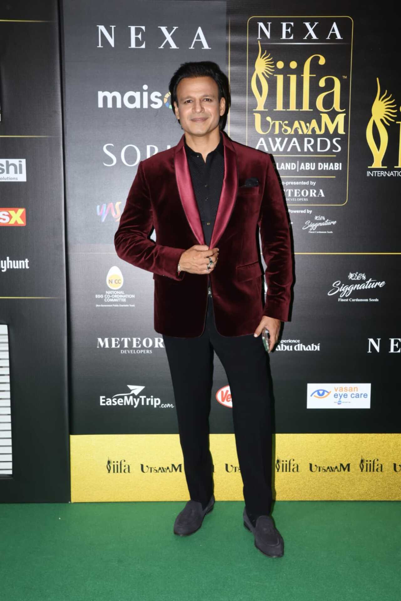 Actor Vivek Oberoi looked dapper in a crimson velvet tuxedo for the night. 