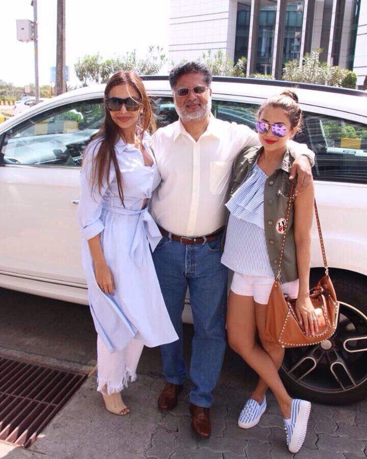 'Dad Day Out' is the caption Malaika Arora wrote while sharing this beautiful picture of herself posing with her dad and younger sister Amrita