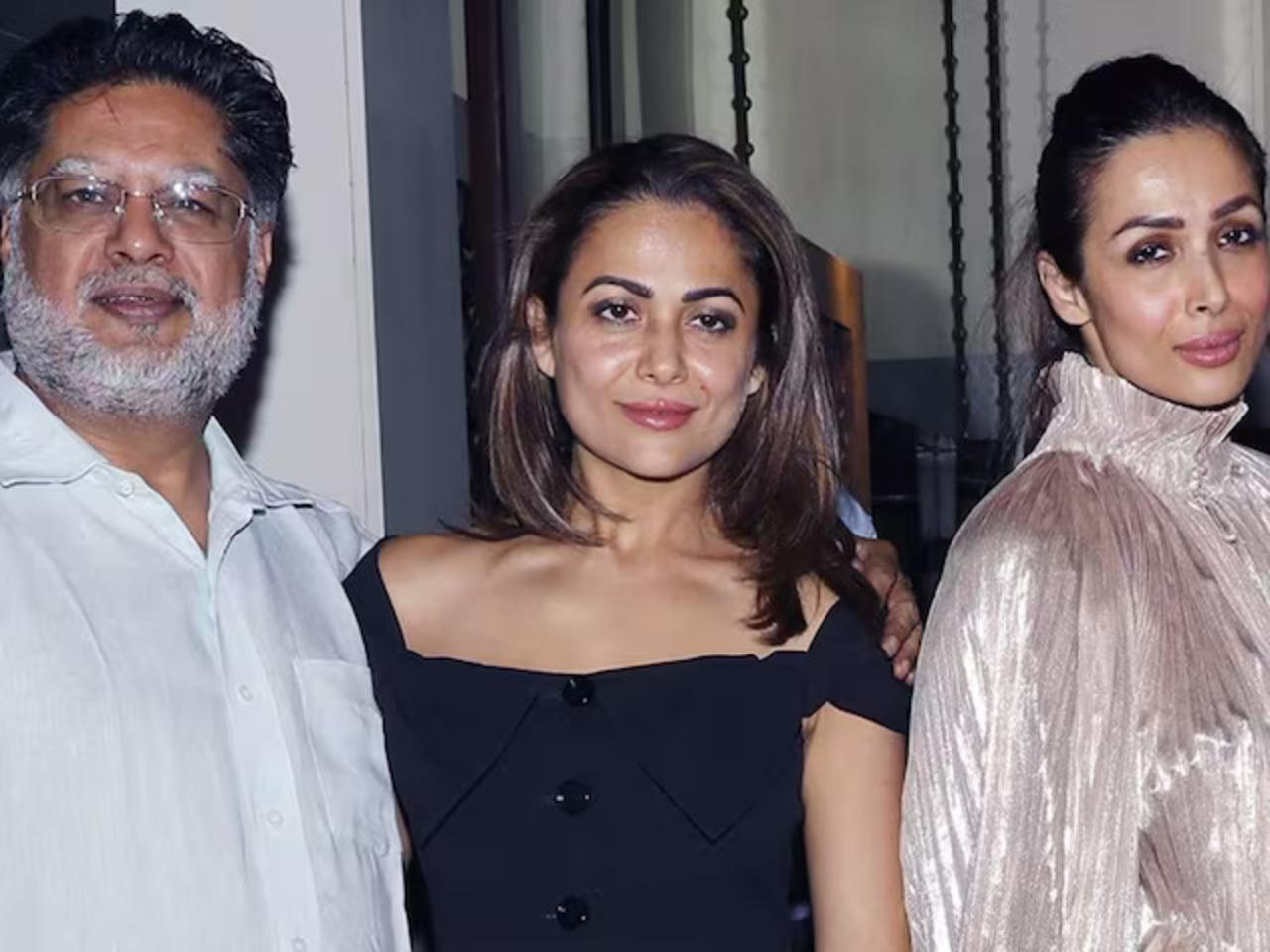 Yet another picture that brings tears to our eyes shows the Arora sisters posing with their daddy dearest