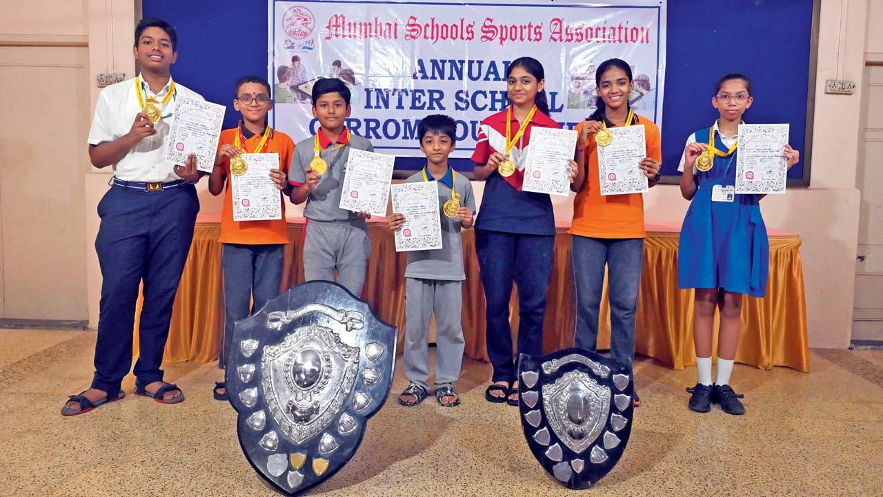 MSSA’s carrom champions (from left to right) Sarthak Kerkar, Neeil Mhatre, Prasanna Gole, Hridhaan Shah, Nidhi Kulkarni, Greeshma Dhamankar and Gauri Sawant with their medals on Saturday