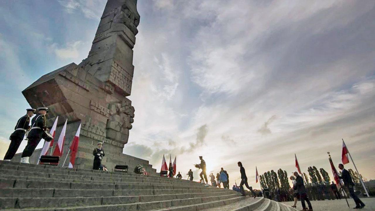 Poland holds state burial for over 700 WWII victims