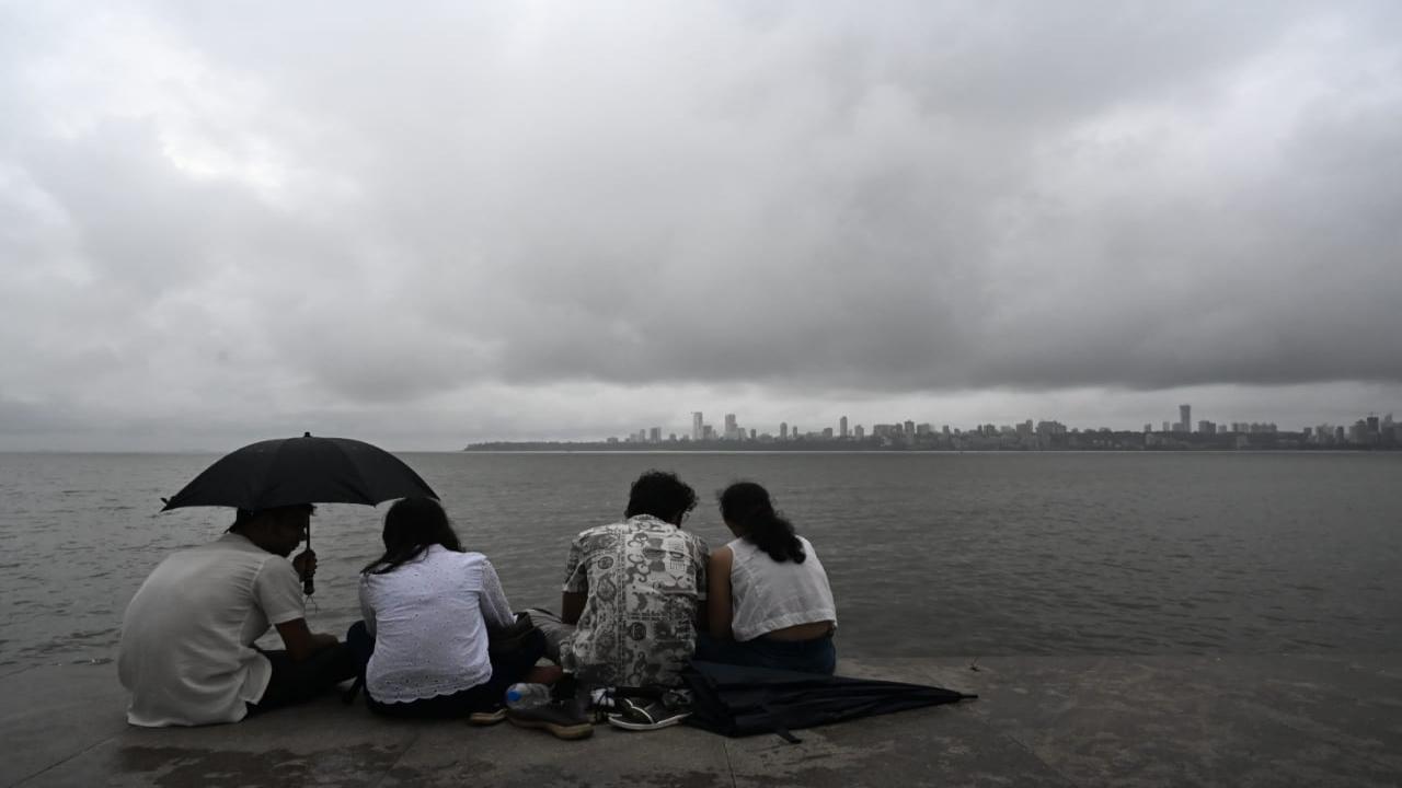 Revellers enjoy the weather at Nariman Point on Thursday evening