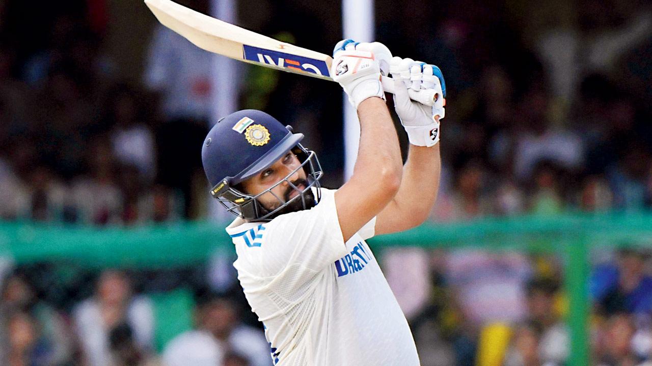 Rohit Sharma hammers a six against Bangladesh yesterday. Pic/Getty Images