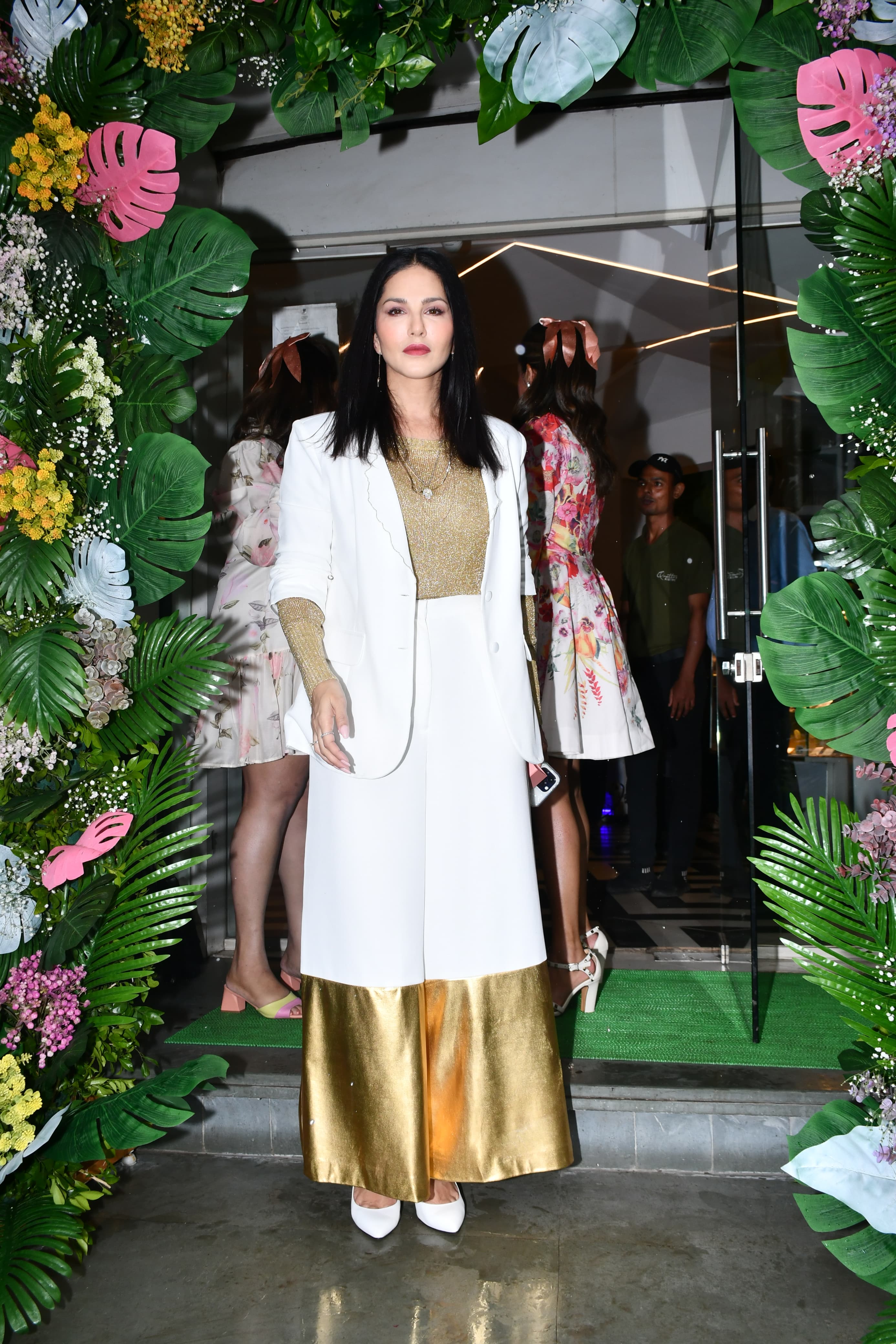 Sunny Leone wore a white and golden outfit as she attended an event in the city